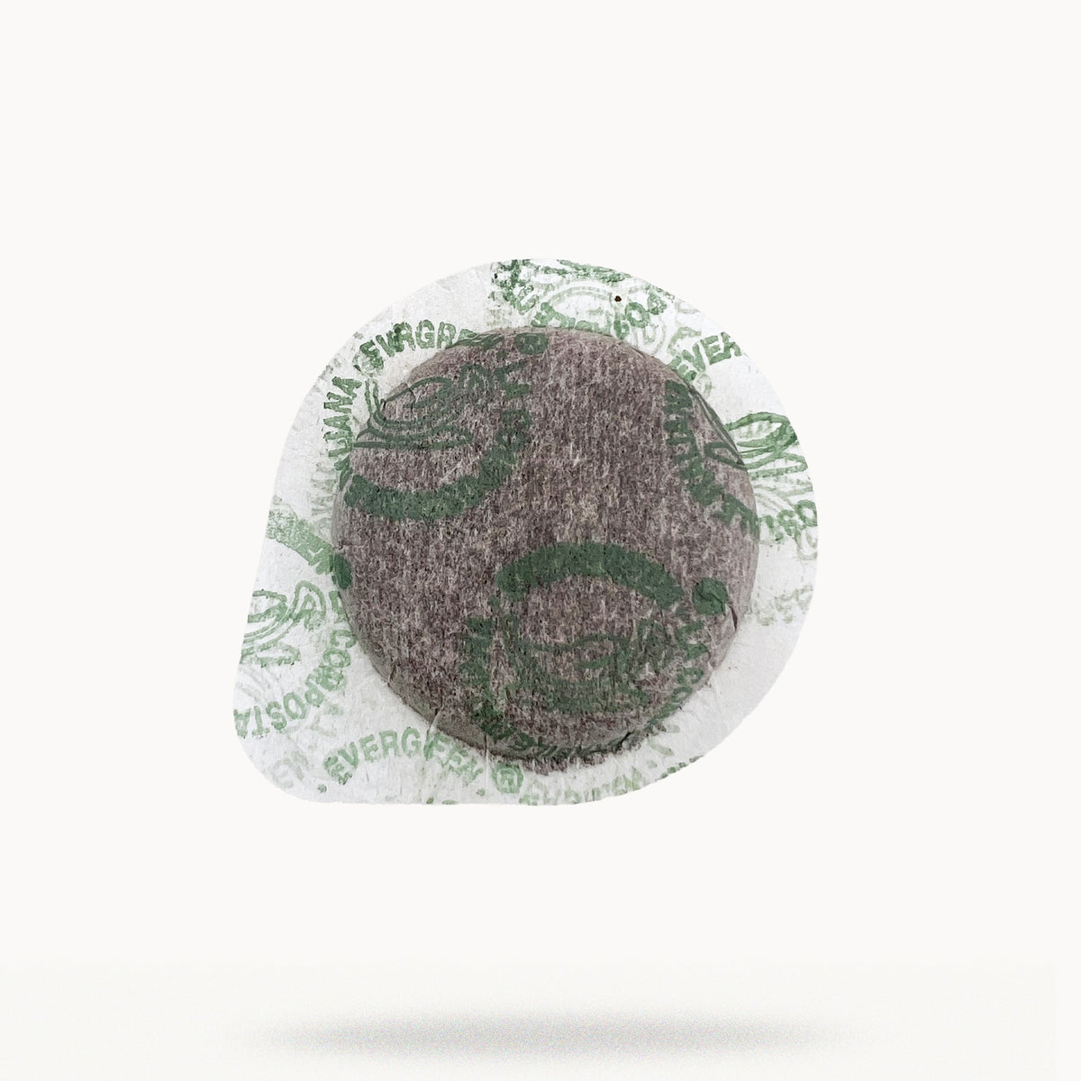 44 mm paper ESE pod with ground and tamped Tiomoka coffee