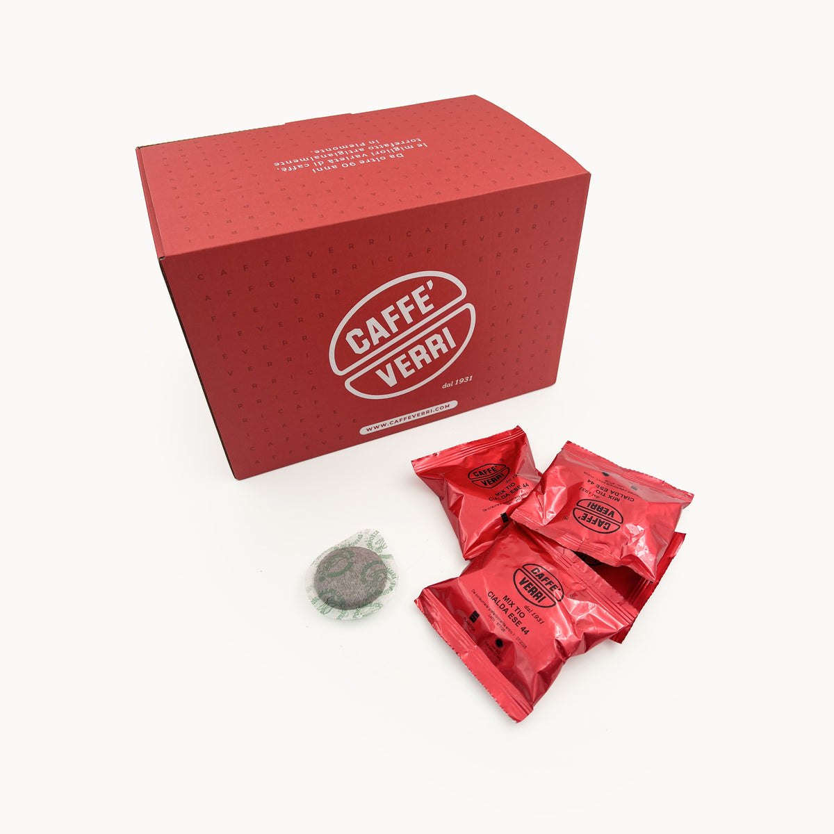 Red Caffè Verri box of 50 Tiomoka ESE pods with the single-serve sachets and a paper pod